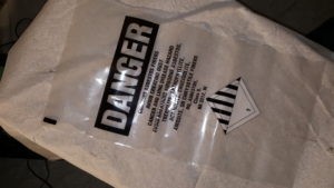 Plastic bag packaging for transport of asbestos