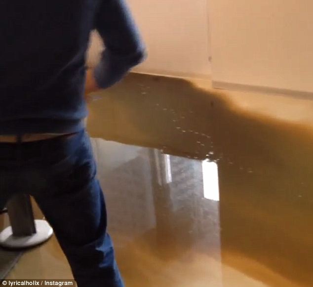 Adrift in it: Kasey Moore of ad agency Arc Worldwide posted a video that makes all too clear the extent of the sewage leak on the 15th floor of the 50-story Leo Burnett building