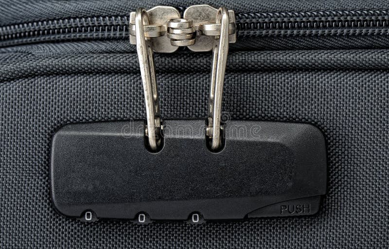 Combination lock for zipper on a suitcase. Closeup stock image