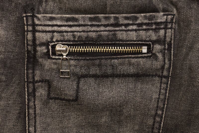 Gray jeans back pocket with zip lock. Closeup stock image