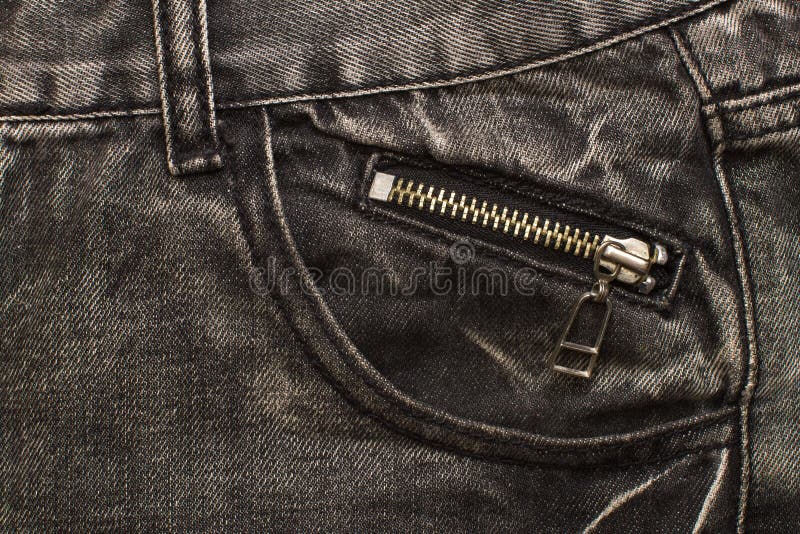 Gray jeans pocket with zip lock. Closeup royalty free stock image