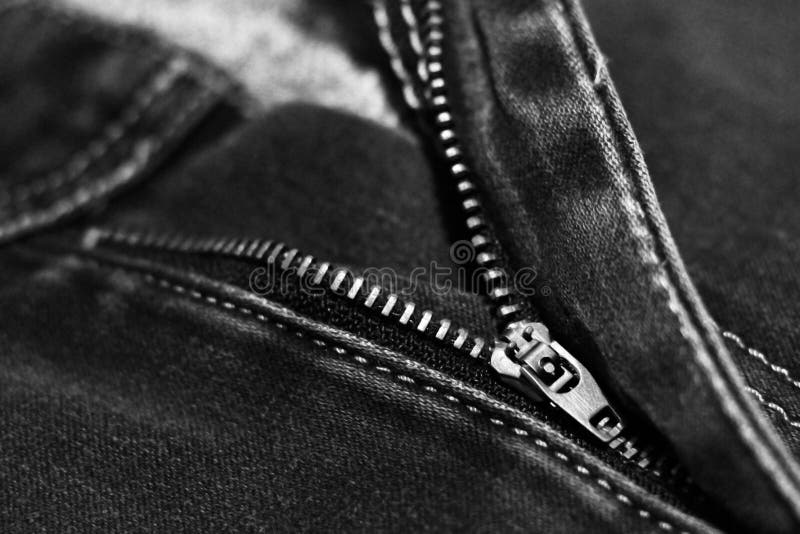 Jeans with broken lock zipper. Metal object stock photo