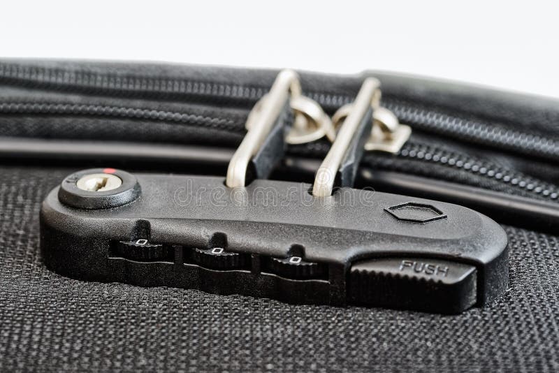 Lock with numbers on suitcase zipper. Close-up view to lock with numbers on suitcase zipper royalty free stock images