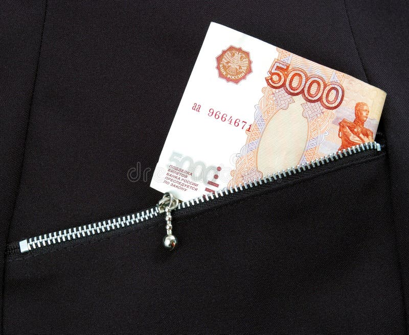 Money in pocket. Bill 5000 rubles pocket with lock-zipper royalty free stock photo