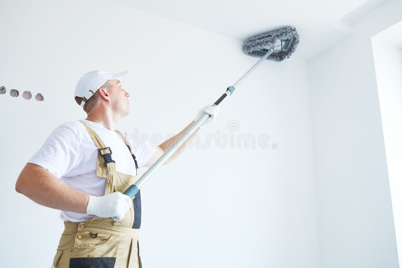 Painter works with triangle drywall cleaning tool. Surface preparation for painting. Painting preparation at home impovement. Painter cleaning drywall after stock images