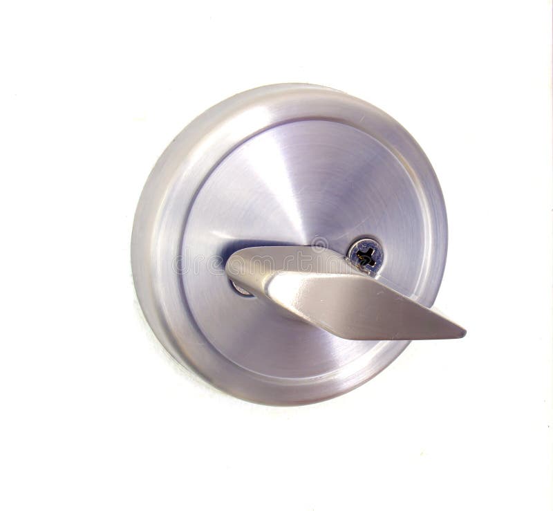 Shut off door with a round pocket door lock on a white door.  stock photo