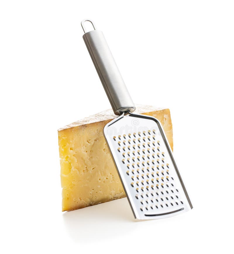 Tasty cheese block and cheese grater. Isolated on white background stock photo
