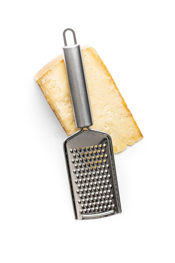 Tasty cheese block and cheese grater. Isolated on white background stock images