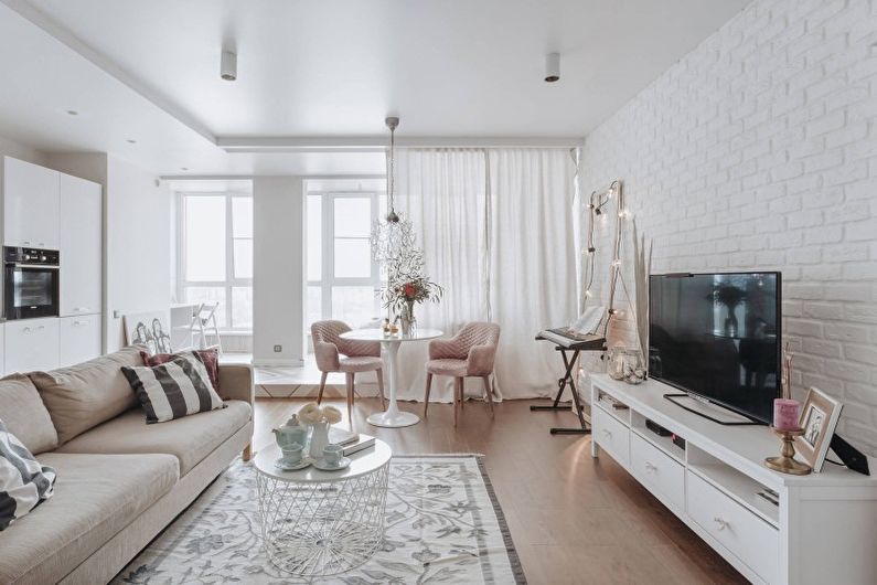 Дизайн интерьера гостиной в белом цвете - фото