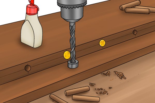 Image showing a drill stop preventing a drill from entering a wooden board deeper than the desired length